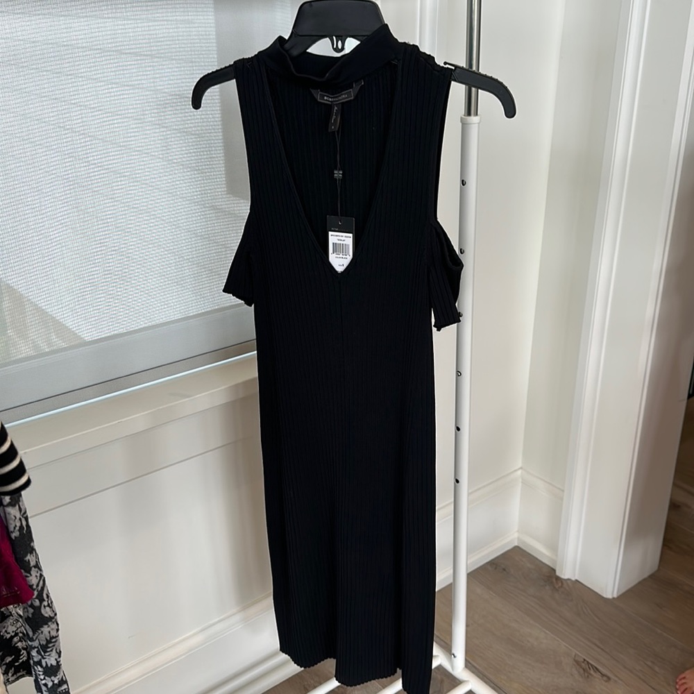 New with tags BCBG Max Azria black knit dress. Never worn.
